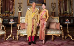 Thailand's King Maha Vajiralongkorn poses with former royal noble consort Sineenat Bilaskalayani, also known as Sineenat Wongvajirapakdi, who was dramatically stripped of all her royal titles by the palace on October 21 – a shock move less than three months after she was bestowed with a position that had not been used for nearly a century. Photo: AFP/Thailand’s Royal Office