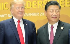 Donald Trump and Xi Jinping pictured at the 2017 Apec summit in Vietnam. Photo: AFP