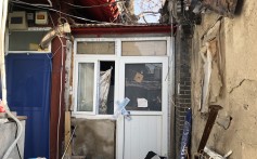 A rundown Beijing home with standing-room only space sells for record, in a sign of desperation for hukou in the Chinese capital