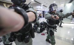 Riot police make an arrest at the Telford Plaza shopping centre in Kowloon Bay. Photo: Edmond So