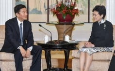 Luo Huining meets Hong Kong Chief Executive Carrie Lam in December 2018. Photo: HANDOUT from ISD