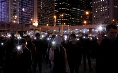Anti-government demonstrators take part in a protest in Edinburgh Place in Hong Kong on December 30. Photo: Reuters