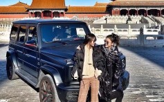 Pictures of the two women posing in front of the SUV prompted an outcry on social media. Photo: Weibo