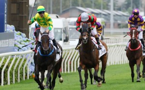 Joao Moreira salutes as Sky Darci wins the BMW Hong Kong Derby on Sunday. Photo: Kenneth Chan