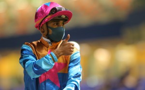 Karis Teetan gives the thumbs up after collecting a treble at Happy Valley on Thursday night. Photo: Kenneth Chan