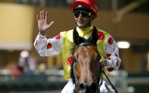 Karis Teetan celebrates his 500th Hong Kong winner aboard Shadow Runner. Photo: HKJC