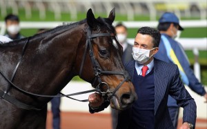Douglas Whyte celebrates a win with Will Power. Photo: Kenneth Chan