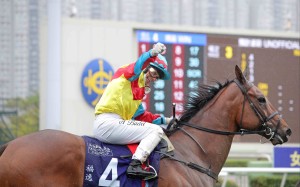 Alexis Badel celebrates winning the Queen’s Silver Jubilee Cup aboard Wellington. Photo: HKJC