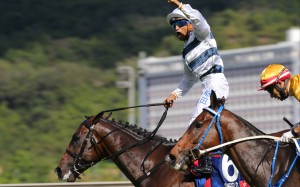 Karis Teetan celebrates victory aboard Panfield in the Group One Champions & Chater Cup last season. Photo: Kenneth Chan