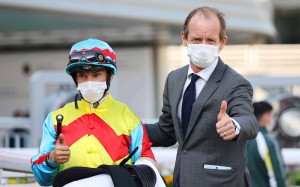 Trainer Richard Gibson and jockey Alexis Badel celebrate Wellington’s Sprint Cup win. Photo: HKJC