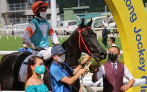 Jockey Joao Moreira celebrates a winner on Sunday before later suffering dehydration. Photos: Kenneth Chan