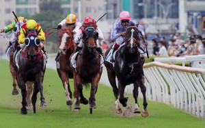 Horses thunder down the straight at Sha Tin on Sunday. Photos: Kenneth Chan