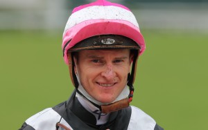Zac Purton smiles during his four-timer on Sunday. Photos: Kenneth Chan