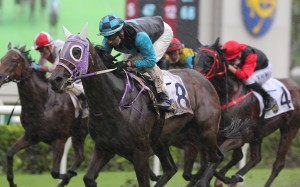 Joao Moreira salutes aboard Super Sunny Sing at Sha Tin on Friday. Photos: Kenneth Chan
