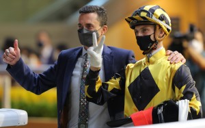 Trainer Douglas Whyte and jockey Lyle Hewitson celebrate Durham Star’s victory at Happy Valley on Wednesday night. Photos: Kenneth Chan