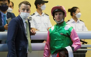 Trainer Jamie Richards and jockey Zac Purton dissect a replay at Happy Valley on the weekend. Photos: Kenneth Chan