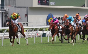 Zac Purton salutes aboard Mega Bonus at Happy Valley. Photos: Kenneth Chan