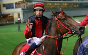 Hugh Bowman after winning aboard Country Star at Happy Valley in 2018. Photos: Kenneth Chan