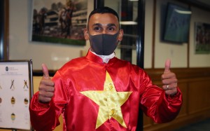 Karis Teetan celebrates his win aboard King Eccellente. Photo: Kenneth Chan