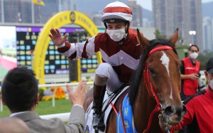 A beaming Vagner Borges dishes out high fives after winning aboard Sight Success at Sha Tin on Sunday. Photos: Kenneth Chan