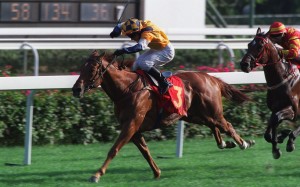 Charming City extends under Shane Dye to win the 2001 Classic Mile at Sha Tin. Photo: Oliver Tsang