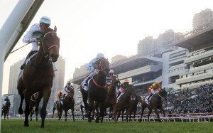 Voyage Bubble (left) beats Tuchel and Packing Treadmill to win the Classic Mile. Photo: Kenneth Chan
