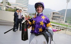 Zac Purton enjoys his four-timer at Sha Tin on Saturday. Photo: Kenneth Chan