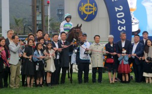 Trainer Ricky Yiu and jockey Alexis Badel celebrate Voyage Bubble’s Hong Kong Derby victory with connections. Photo: Kenneth Chan