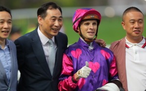 Trainer Michael Chang (second from left) celebrates his first treble in nine years at Sha Tin on Sunday. Photo: Kenneth Chan