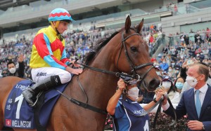 Jockey Ryan Moore and trainer Richard Gibson with Wellington after his Hong Kong Sprint victory. Photos: Kenneth Chan