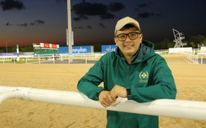 Pierre Ng watches trackwork at Meydan in March. Photos: Kenneth Chan