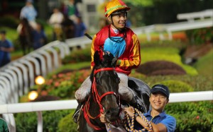 Derek Leung is all smiles after his third straight victory aboard Encountered. Photos: Kenneth Chan