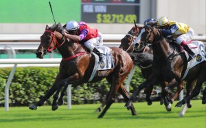 Zac Purton drives Ensued to victory at Sha Tin on Sunday. Photos: Kenneth Chan