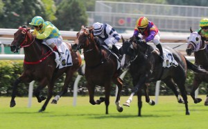 Andrea Atzeni lifts Champion Method (left) to victory at Sha Tin on  Sunday. Photo: Kenneth Chan