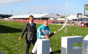 Trainer Danny Shum and jockey James McDonald celebrate in the aftermath of Romantic Warrior’s Cox Plate victory. Photo: Kenneth Chan