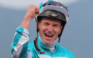 James McDonald celebrates after winning April’s Group One QE II Cup (2,000m) aboard Romantic Warrior. Photo: Kenneth Chan