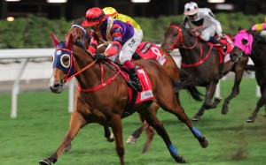 Happy Together wins the Class Two Saturn Handicap (1,650m) at Happy Valley on Wednesday under Alexis Badel. Photo: Kenneth Chan
