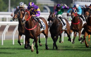 Helios Express powers to victory under Hugh Bowman at Sha Tin on Sunday. Photos: Kenneth Chan