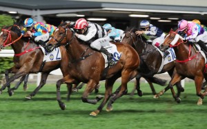 Dan Attack salutes under French jockey Antoine Hamelin at Happy Valley last night. Photo: Kenneth Chan