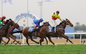 Jockey Brenton Avdulla salutes as California Spangle wins the Group One Al Quoz Sprint (1,200m) at Meydan on Saturday night. Photos: Kenneth Chan