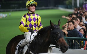 Jockey Ben Thompson is all smiles after Ernest Feeling’s victory at Happy Valley on Wednesday night. Photo: Kenneth Chan