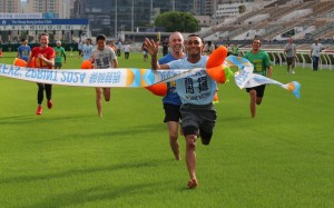 Karis Teetan surges clear to win the annual jockeys’ sprint at Sha Tin on Saturday. Photos: Kenneth Chan