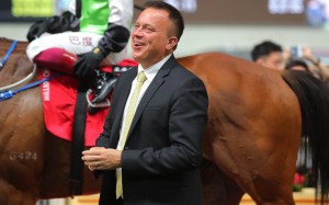 Caspar Fownes is all smiles on his way to a Wednesday night treble. Photo: Kenneth Chan