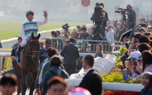James McDonald waves to the Sha Tin crowd after Voyage Bubble’s win on Sunday. Photo: Kenneth Chan
