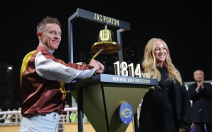 Zac Purton and wife Nicole after the champion jockey broke the all-time record for Hong Kong wins at Happy Valley on Wednesday night. Photos: Kenneth Chan 