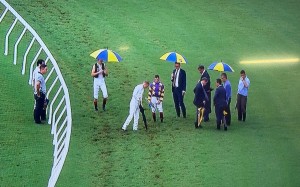 Jockeys and officials inspect the Sha Tin track on Sunday. Photos: Kenneth Chan