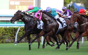 Kempes (pink cap) and Andrea Atzeni fly home to win at Sha Tin. Photos: Kenneth Chan