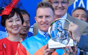 Jockey Zac Purton with his The Everest trophy. Photo: HKJC