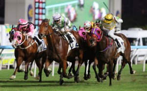 Light Years Charm (centre) salutes at Sha Tin on Sunday. Photos: Kenneth Chan