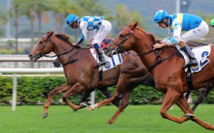Storm Rider surges home to win the Chinese Club Challenge Cup under Karis Teetan. Photos: Kenneth Chan